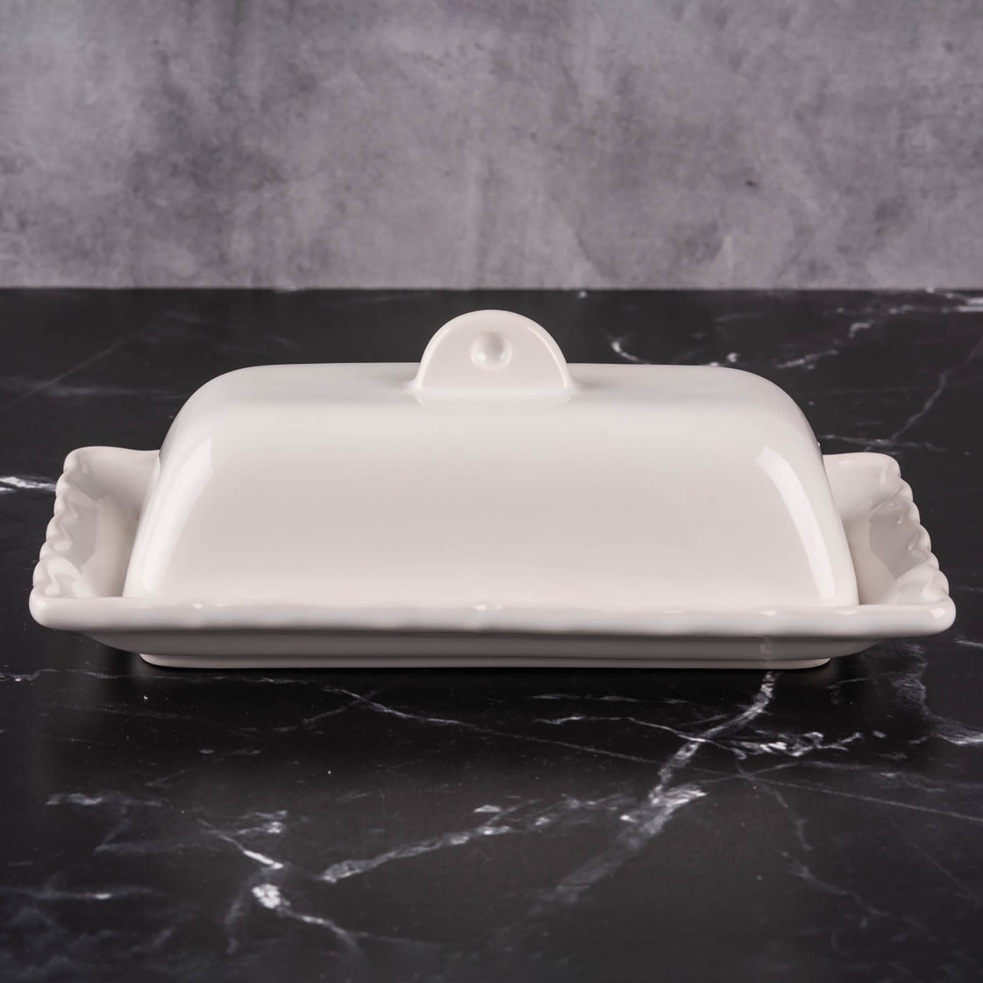 Alessi antequillera «vestida» en porcelana con tapa en acero